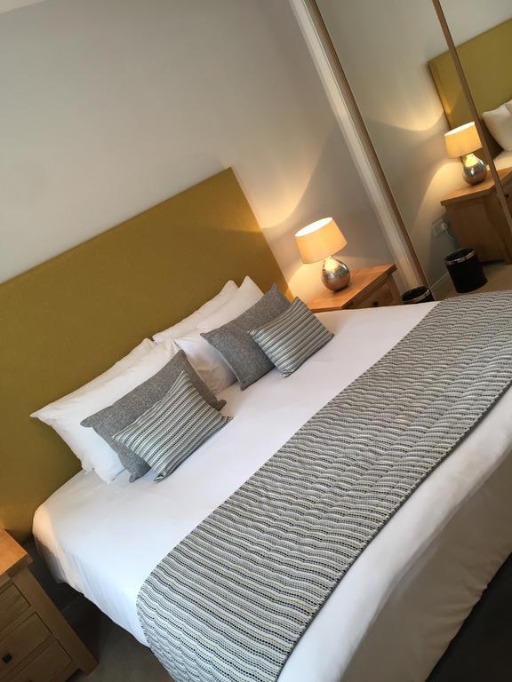 Inverness City Suites Szoba fotó